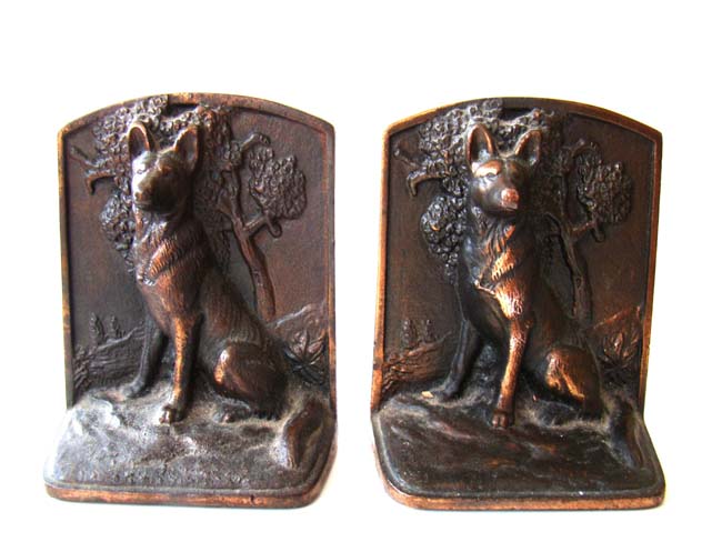 A pair of cast iron German Shepherd bookends circa 1925
